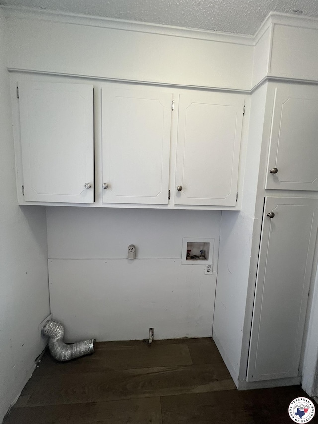 4320 Jefferson Ave, Texarkana, AR 71854 - laundry area with wood finished floors, hookup for a washing machine, and cabinet space