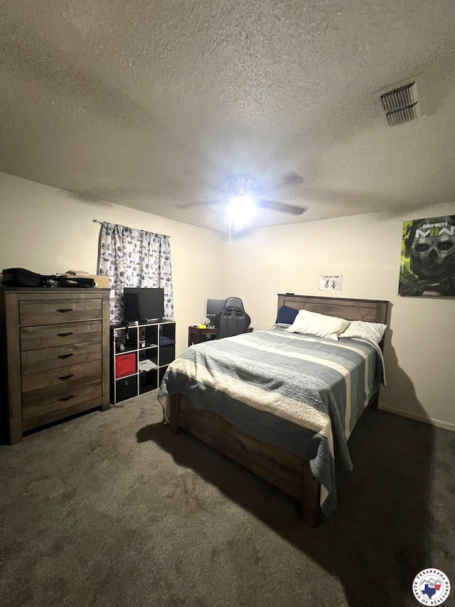 4320 Jefferson Ave, Texarkana, AR 71854 - carpeted bedroom featuring a textured ceiling and ceiling fan