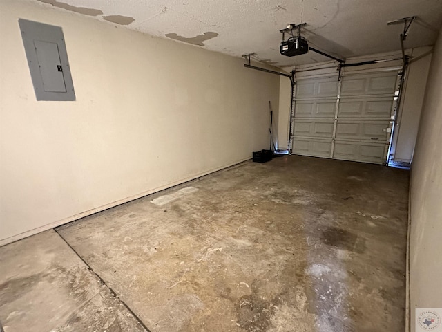 garage featuring a garage door opener and electric panel