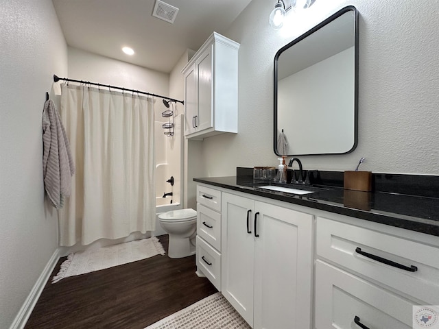 375 Fm 2149, New Boston, TX 75570 - full bath with toilet, wood finished floors, vanity, visible vents, and shower / bath combo