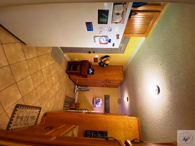 kitchen featuring a textured wall