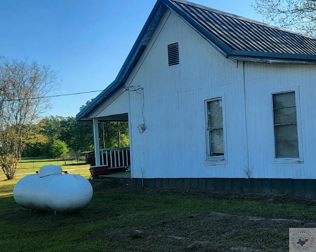 view of property exterior featuring a yard