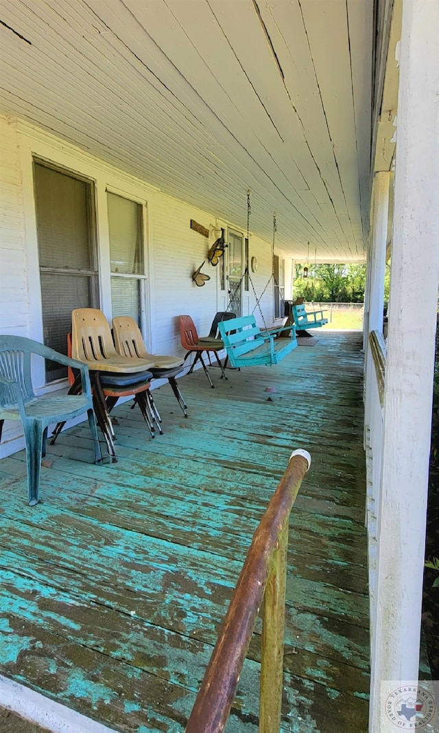 wooden deck featuring a porch