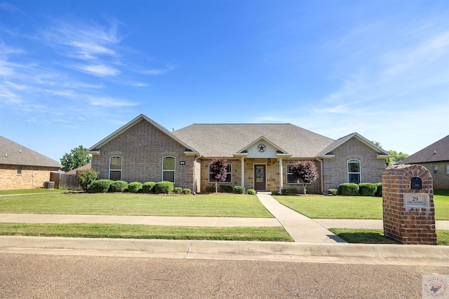 view of front of home with a front yard