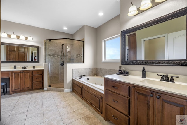 bathroom featuring independent shower and bath, tile patterned flooring, and vanity