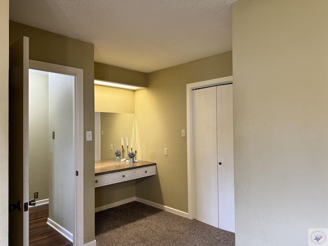 bathroom with a textured ceiling