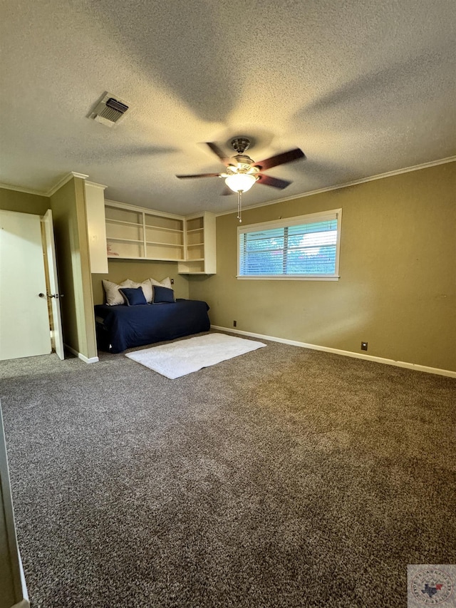 unfurnished bedroom with carpet, a textured ceiling, ceiling fan, and ornamental molding