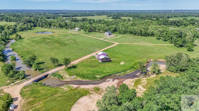 aerial view featuring a rural view and a water view