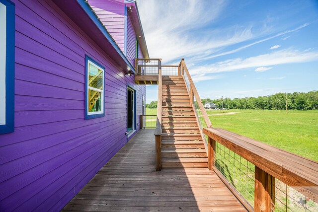 view of property exterior with a lawn