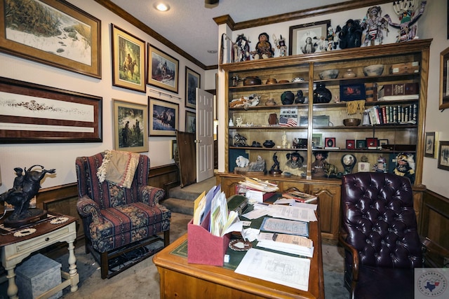 carpeted office featuring crown molding