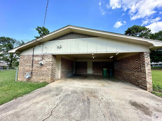 view of side of property featuring a carport