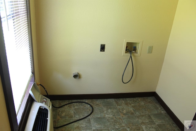 clothes washing area featuring hookup for a washing machine, plenty of natural light, and hookup for an electric dryer