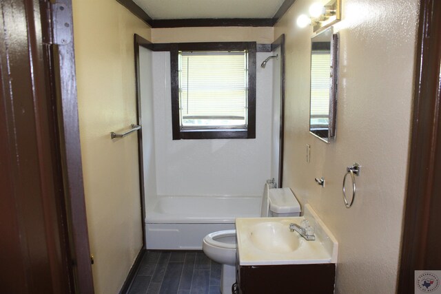 full bathroom with toilet, shower / bathing tub combination, and vanity