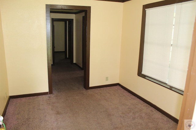 view of carpeted spare room