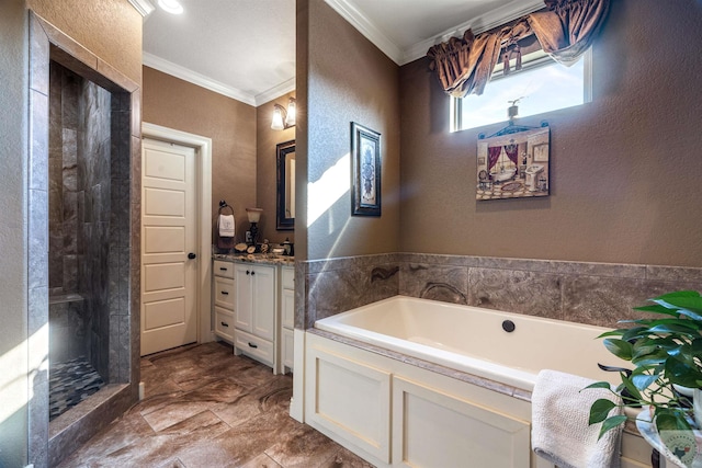 bathroom with separate shower and tub, vanity, and ornamental molding