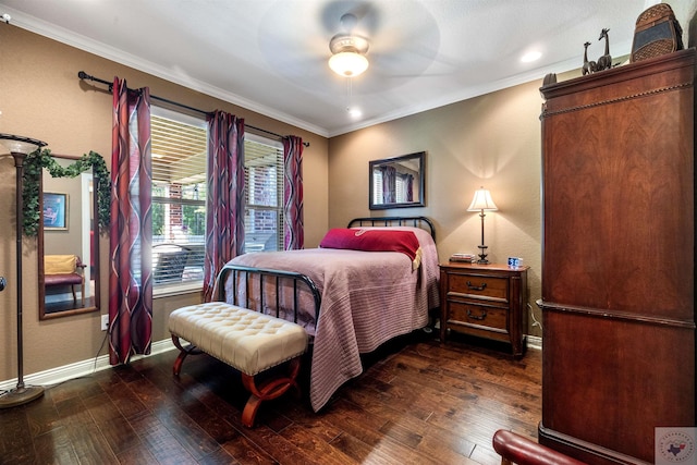 bedroom with crown molding, dark hardwood / wood-style floors, and ceiling fan