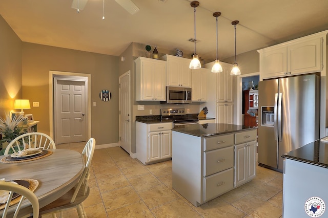 7215 N Richland Dr, Texarkana, TX 75503 - kitchen featuring white cabinets, dark countertops, a kitchen island, appliances with stainless steel finishes, and ceiling fan