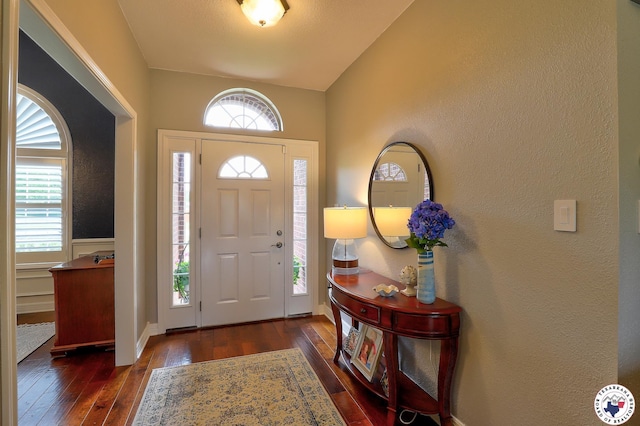 7215 N Richland Dr, Texarkana, TX 75503 - entryway featuring a textured wall and dark wood-style floors