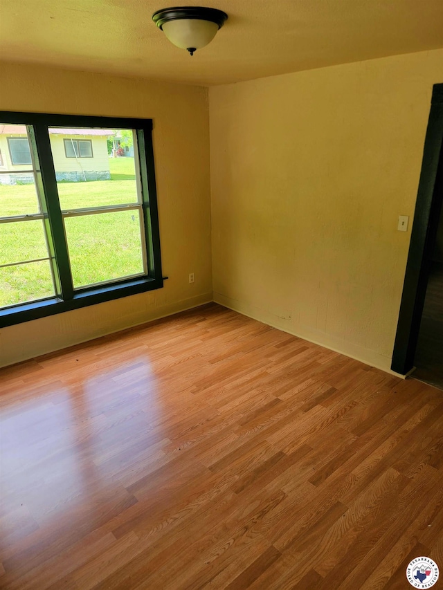 501 S Columbia St, Clarksville, TX 75426 - empty room featuring light wood-style flooring
