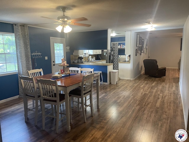 1921 E 40th St, Texarkana, AR 71854 - dining space featuring wood finished floors, ceiling fan, and a textured ceiling