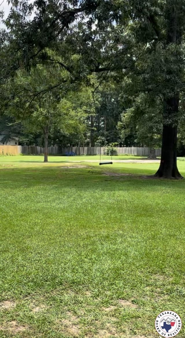 1921 E 40th St, Texarkana, AR 71854 - view of property's community featuring view of wooded area