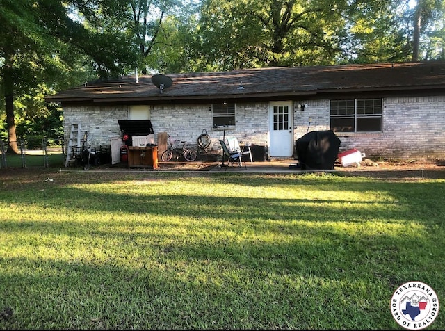 1921 E 40th St, Texarkana, AR 71854 - back of house with brick siding