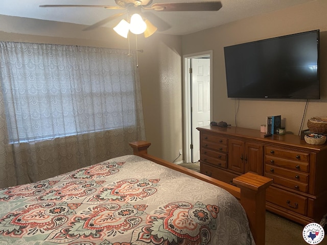 1921 E 40th St, Texarkana, AR 71854 - bedroom featuring a ceiling fan and carpet