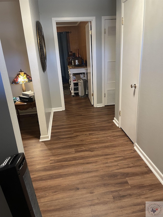 corridor with dark wood-type flooring