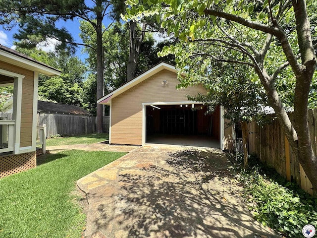 2504 Walnut St, Texarkana, TX 75503 - detached garage featuring concrete driveway