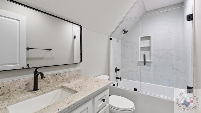 full bathroom featuring vanity, toilet, and tiled shower / bath combo