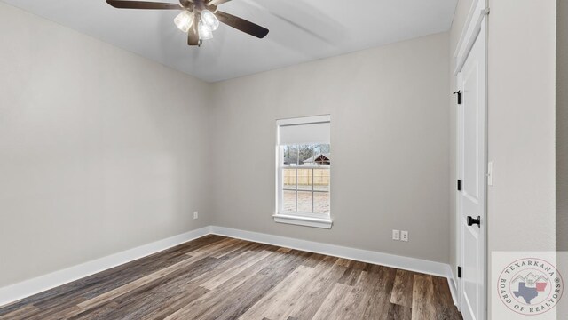 unfurnished room featuring ceiling fan and wood-type flooring