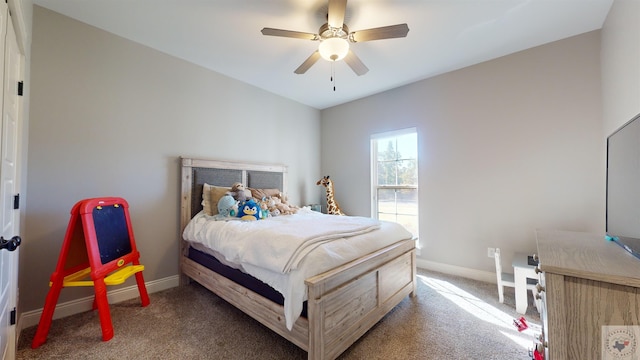 bedroom with ceiling fan and carpet