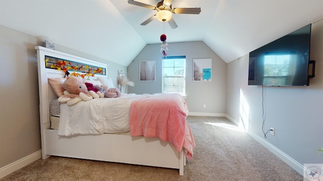 carpeted bedroom with vaulted ceiling and ceiling fan