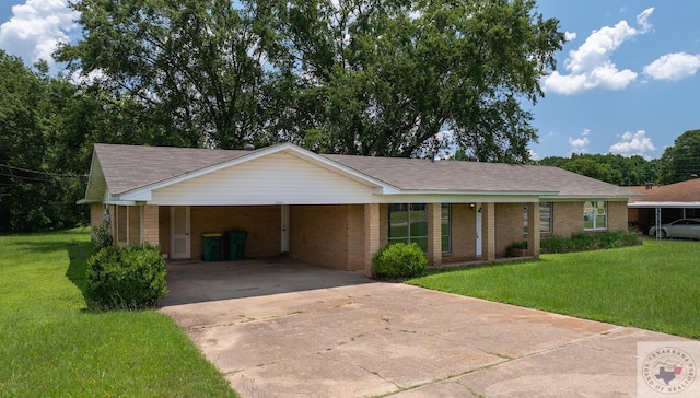 single story home with a front yard and a carport