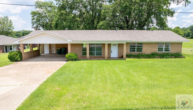 ranch-style house featuring a front yard and a carport