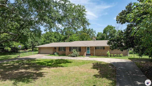 5105 Tennessee Rd, Texarkana, AR 71854 - ranch-style house featuring concrete driveway, brick siding, a garage, and entry steps