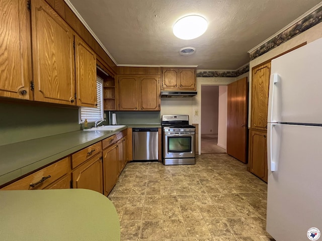 kitchen with brown cabinets, open shelves, appliances with stainless steel finishes, a sink, and under cabinet range hood