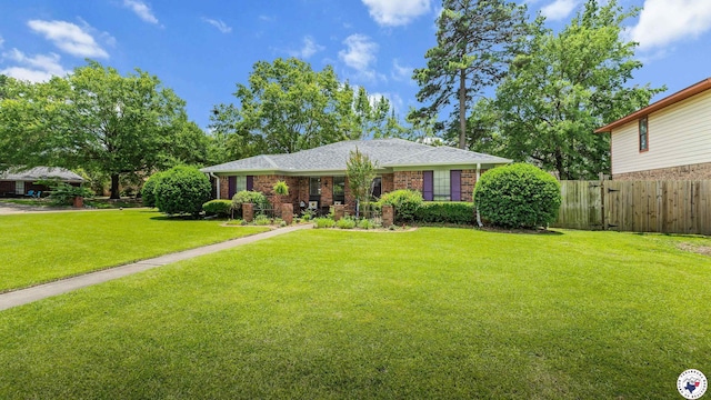 201 Larkspur Ln, Wake Village, TX 75501 - view of front of property featuring brick siding and roof with shingles