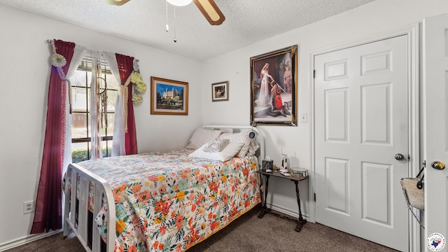 201 Larkspur Ln, Wake Village, TX 75501 - carpeted bedroom featuring multiple windows, a textured ceiling, and ceiling fan