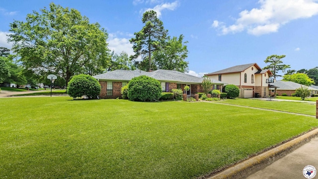 201 Larkspur Ln, Wake Village, TX 75501 - view of front of property with a garage, a front lawn, concrete driveway, and brick siding