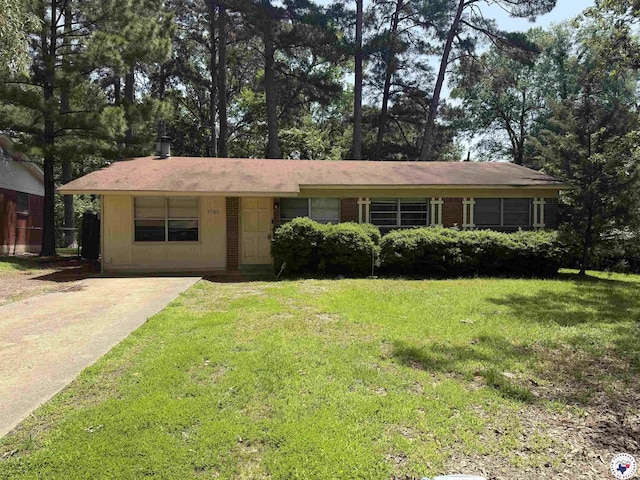 3702 Forestwood St, Texarkana, AR 71854 - ranch-style home with a front yard and concrete driveway