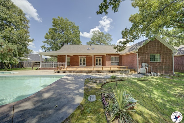 6903 Cherrybark Cir, Texarkana, AR 71854 - back of house with french doors, brick siding, a deck, and a patio