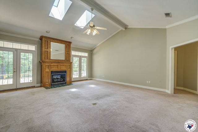 6903 Cherrybark Cir, Texarkana, AR 71854 - unfurnished living room featuring french doors, light colored carpet, ornamental molding, and a large fireplace