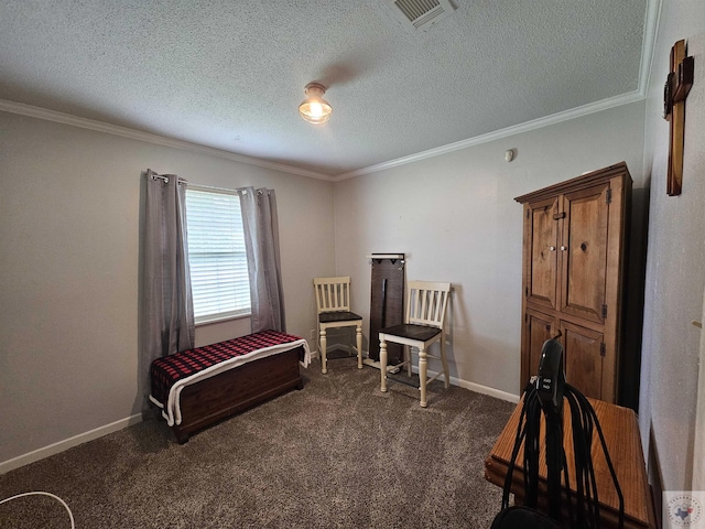 sitting room featuring dark carpet, ornamental molding, and a textured ceiling