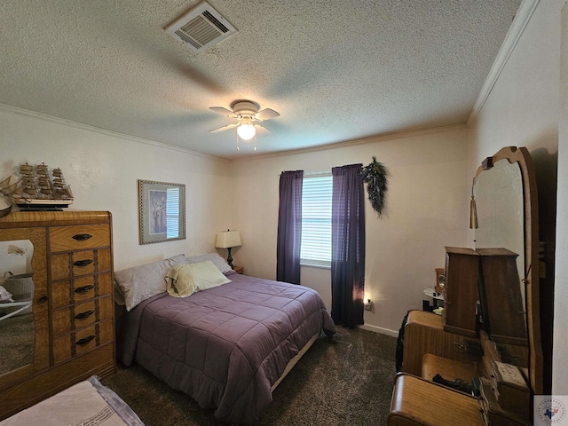 bedroom featuring ceiling fan, dark carpet, crown molding, and a textured ceiling