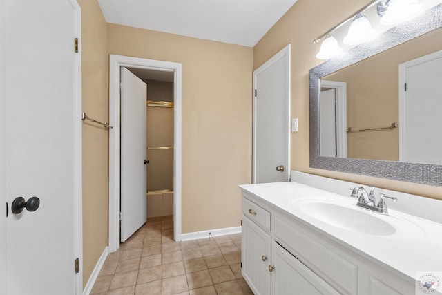 bathroom featuring vanity and tile patterned flooring