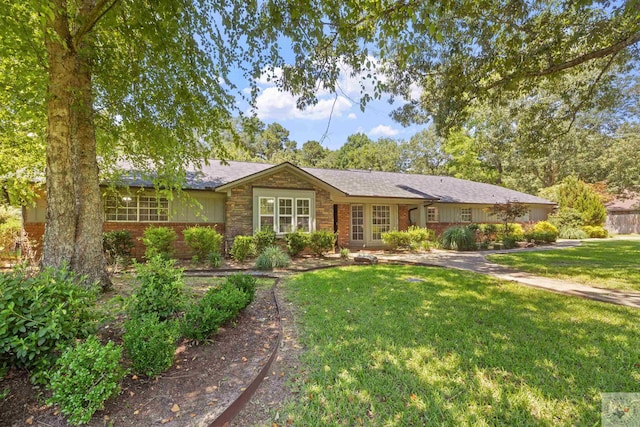 ranch-style house with a front lawn