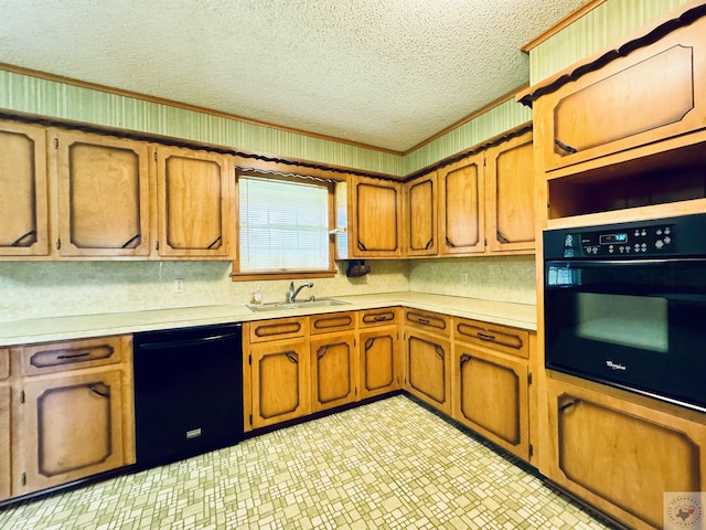 kitchen with sink, ornamental molding, black appliances, and a textured ceiling