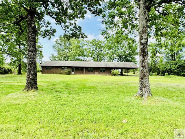 view of front of home with a front yard