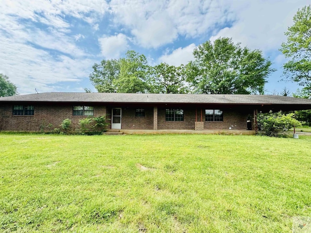 view of front of home with a front lawn